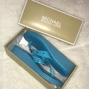 Authentic Micheal Kors studded flip flops